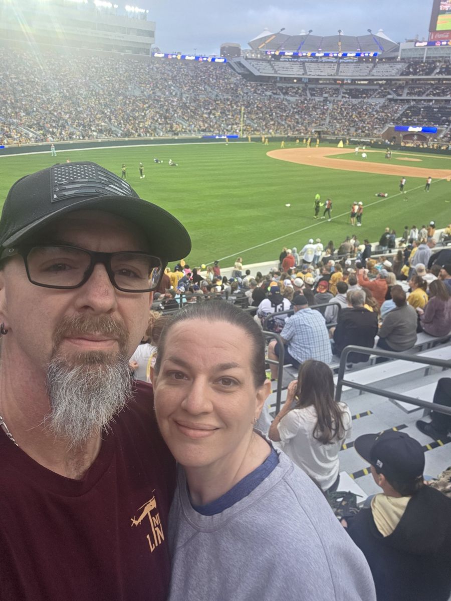 Paul and Diana at a baseball game